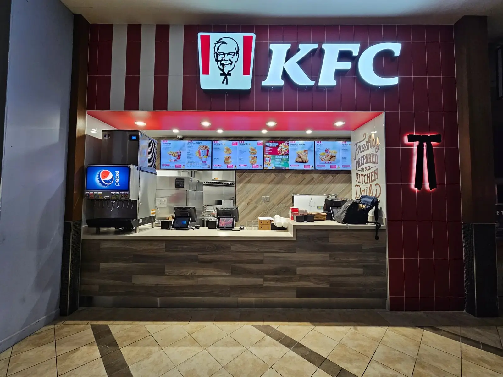 Finished KFC counter and menu boards inside Bramalea Mall